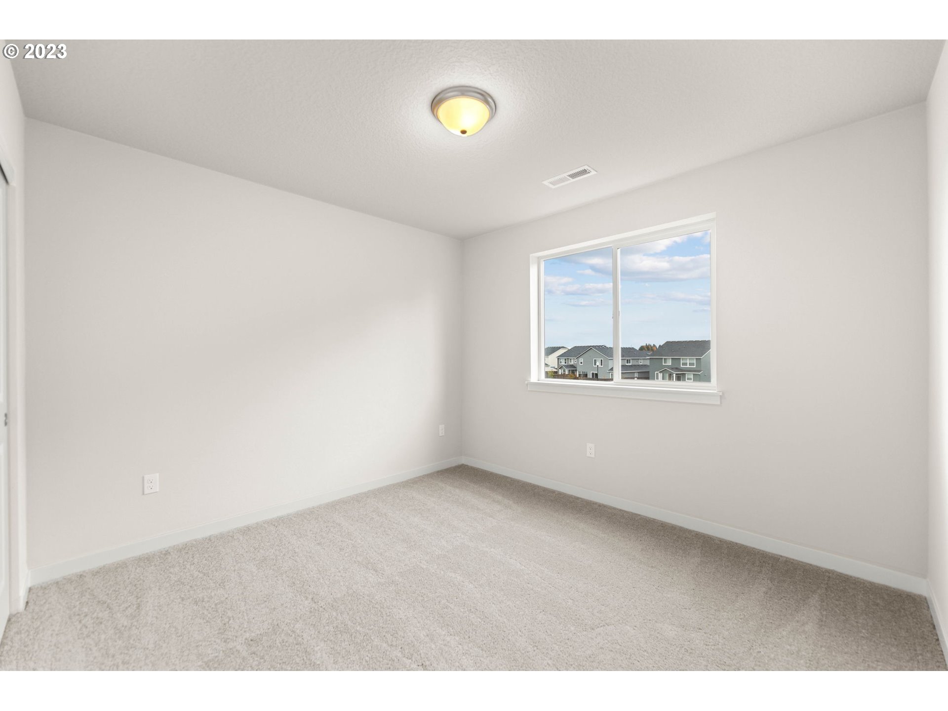 8823 North 3rd Circle Ridgefield, WA 98642 - Photo 21 of 41 a view of an empty room
