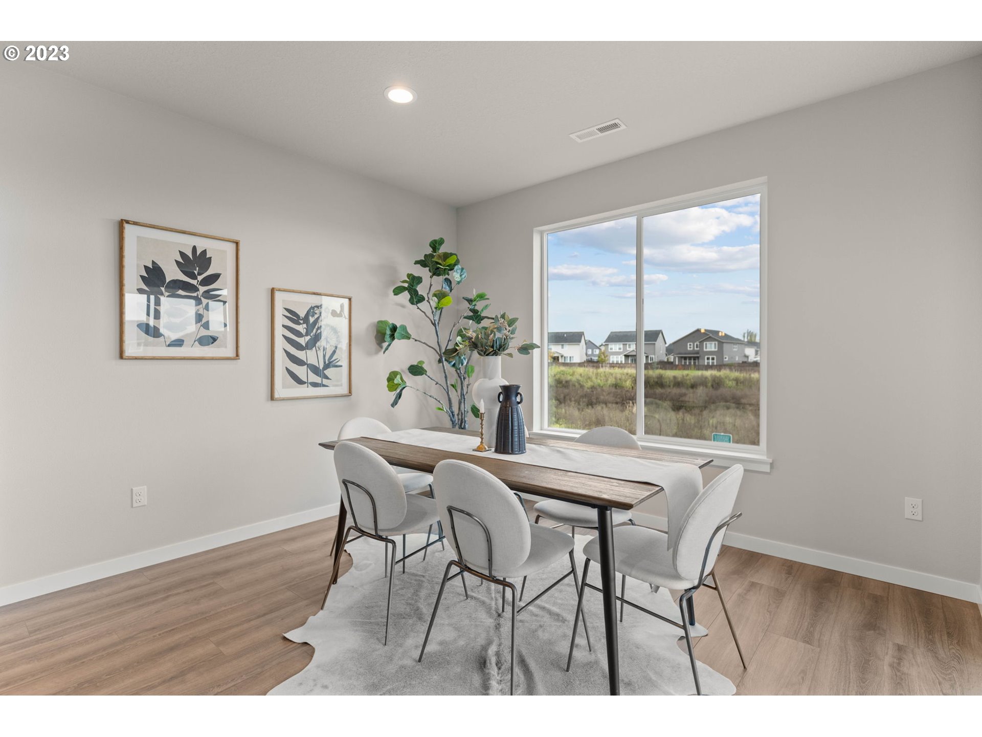 8823 North 3rd Circle Ridgefield, WA 98642 - Photo 28 of 41 a dining room with furniture and window