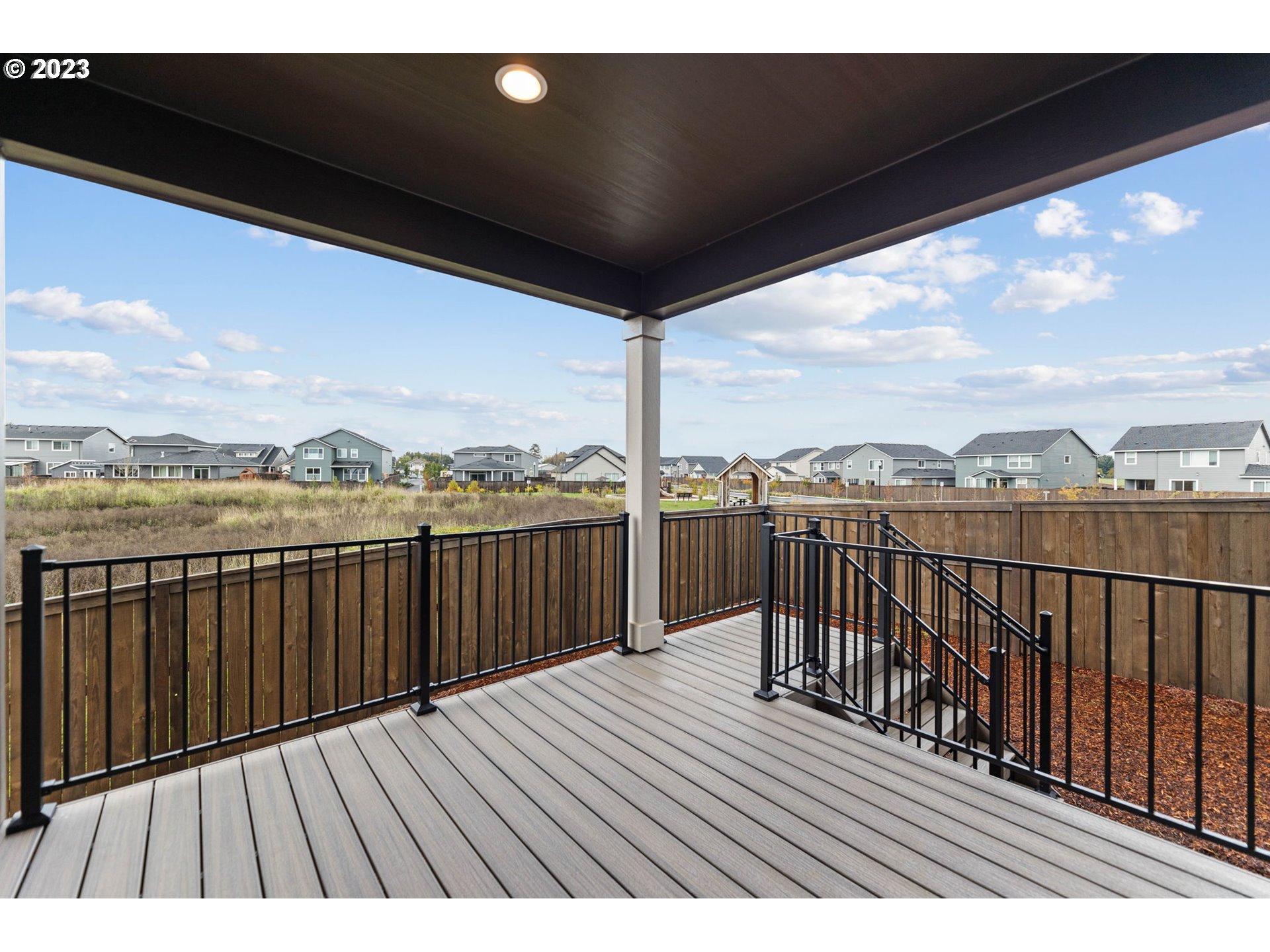 8823 North 3rd Circle Ridgefield, WA 98642 - Photo 40 of 41 a view of balcony with wooden floor
