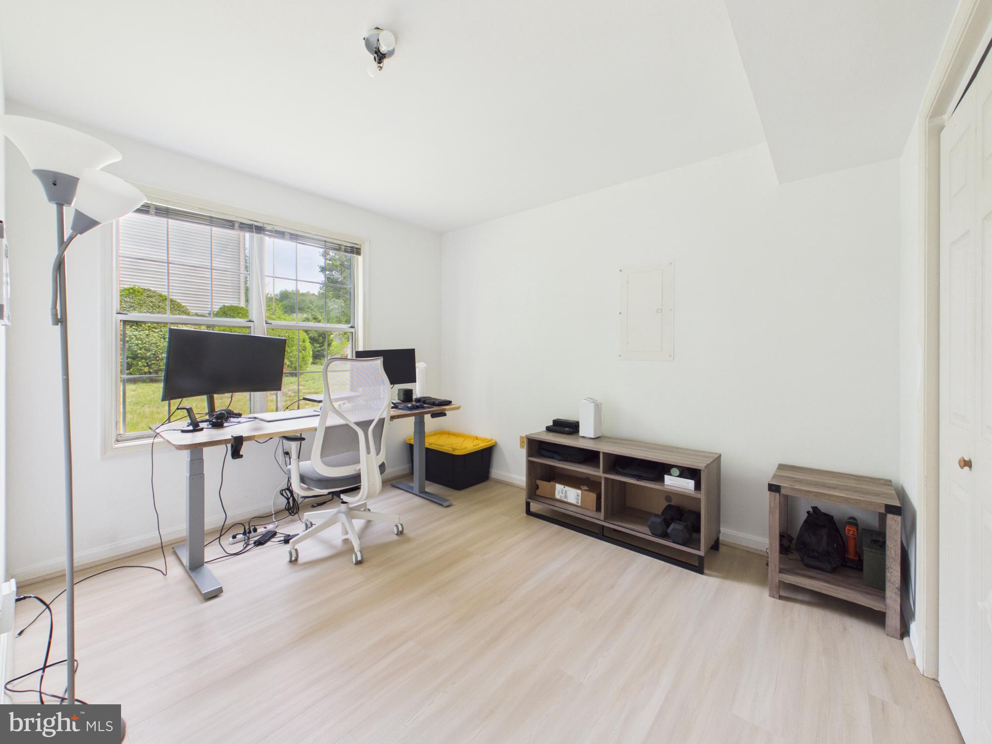7606 Huntsman Court Clinton, MD 20735 - Photo 26 of 40 a view of a workspace with furniture and a window