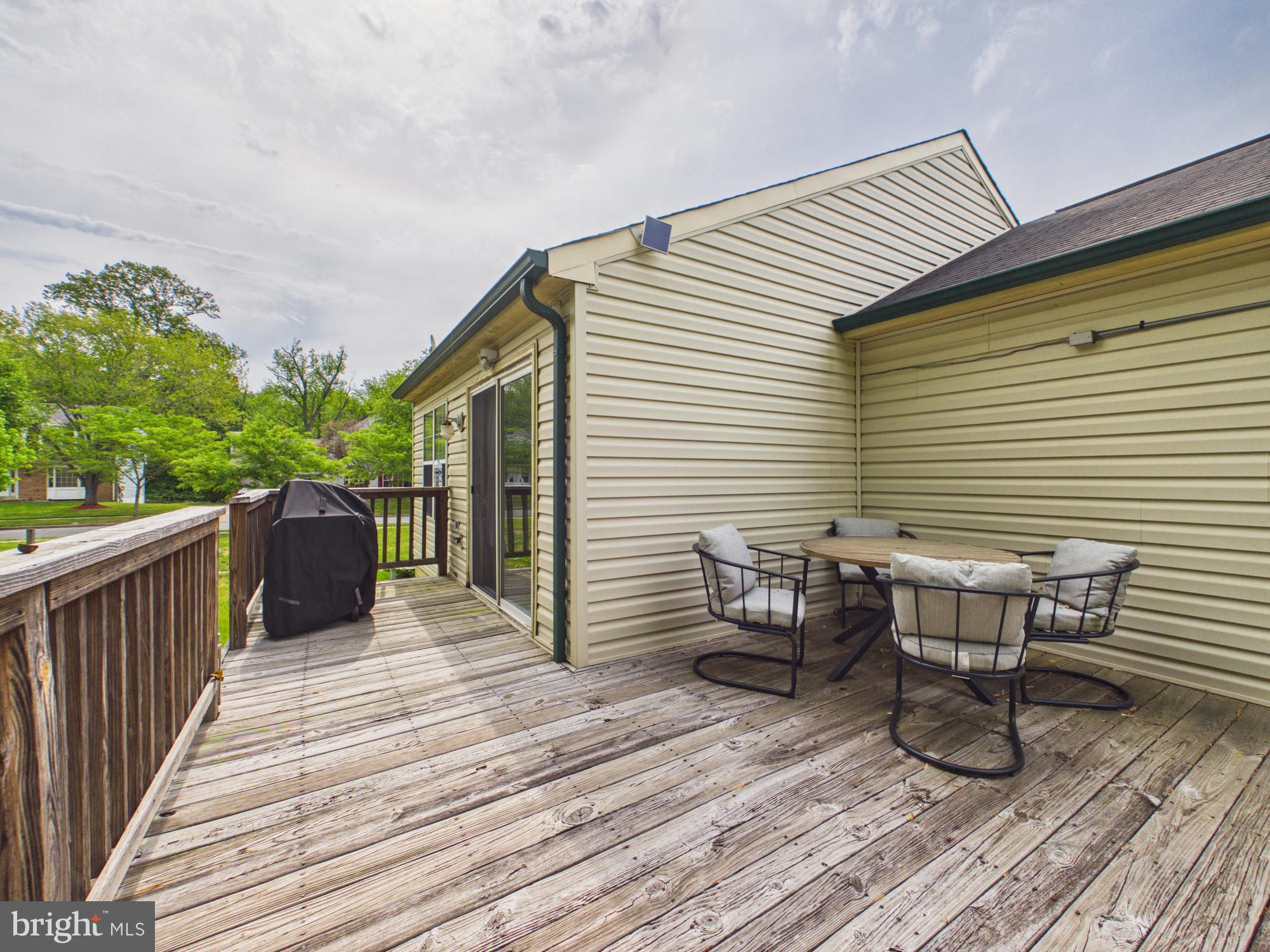 7606 Huntsman Court Clinton, MD 20735 - Photo 36 of 40 a balcony view with a seating space