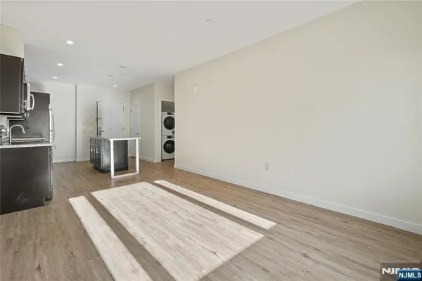 a view of livingroom with furniture and wooden floor