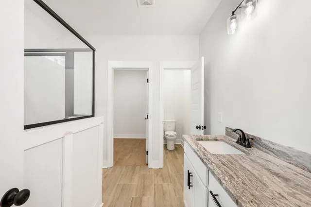 a view of an empty walk in closet