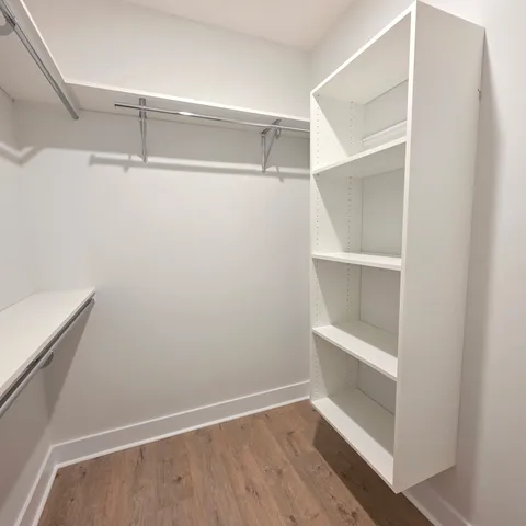 a view of a room with racks on the wall