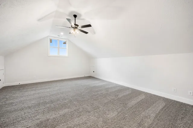 a view of a hallway with stairs