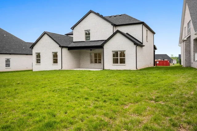 a view of a field with trees