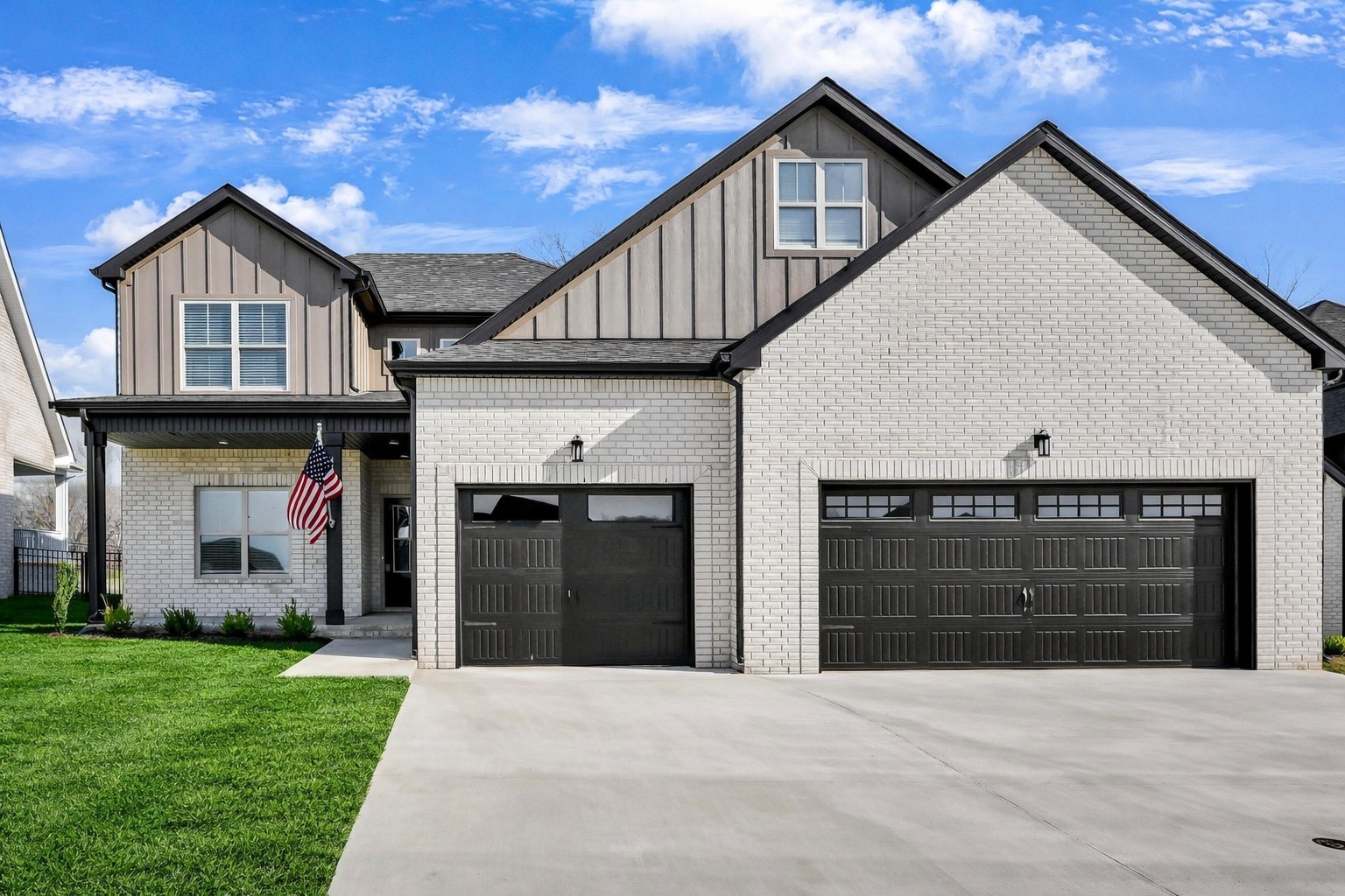 419 Blue Ridge Clarksville, TN 37043 - Photo 6 of 48 a front view of a house with a yard and garage