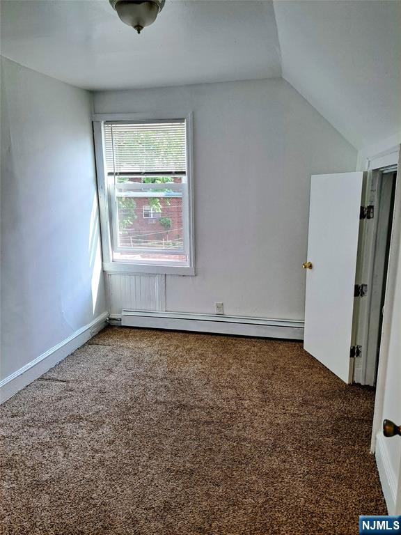 114-116 Myer Street Hackensack, NJ 07601 - Photo 7 of 7 an empty room with a window