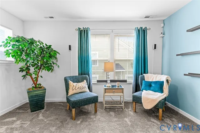 a bathroom with a double vanity sink a mirror and a shower