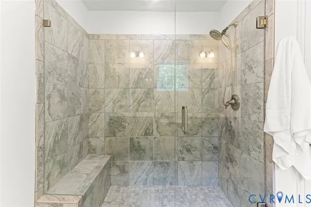 a bedroom with a bed and a table