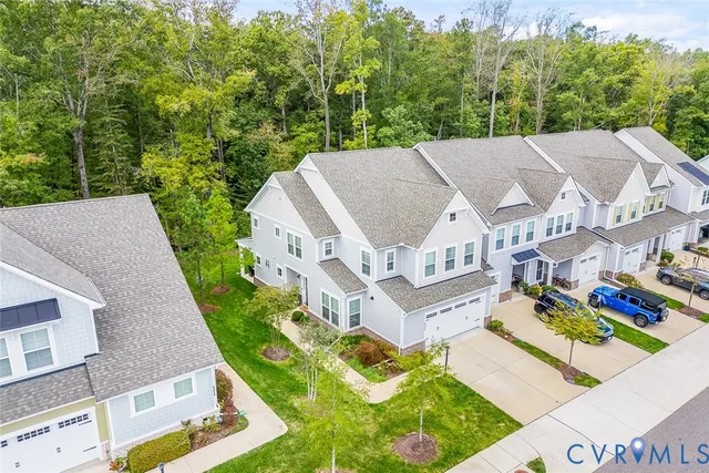 a aerial view of a house with a big yard