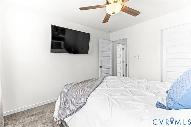 a living room with patio furniture and garden