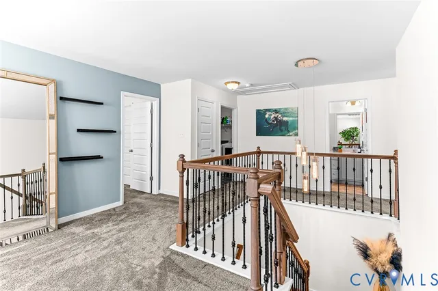 a backyard of a house with a garden and barbeque oven