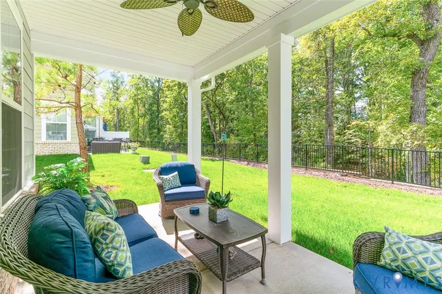 a picture of a bench in front of a wall