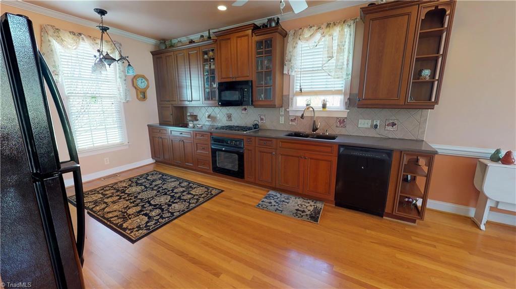7857 Alcorn Road Oak Ridge, NC 27310 - Photo 10 of 28 Guest house Kitchen with hardwood floors.