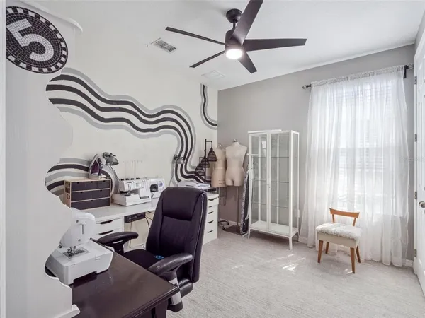 a bathroom with a granite countertop sink mirror and a shower