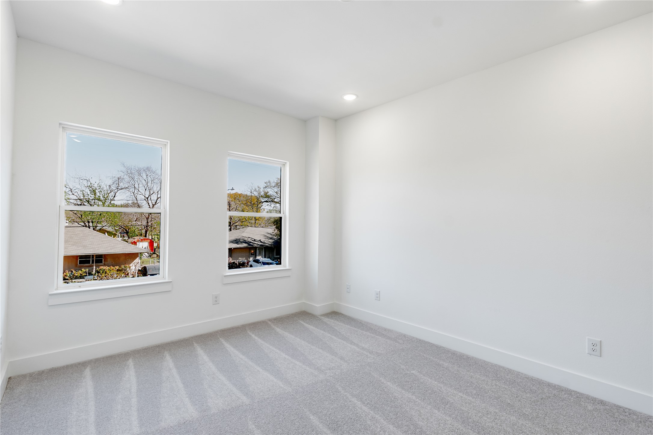 610 East 41st Street, Unit A Houston, TX 77022 - Photo 10 of 20 bedroom 1 of 3 large bedrooms that can easily accommodate a king size bed, 2 night stands, dresser, and an accent chair.