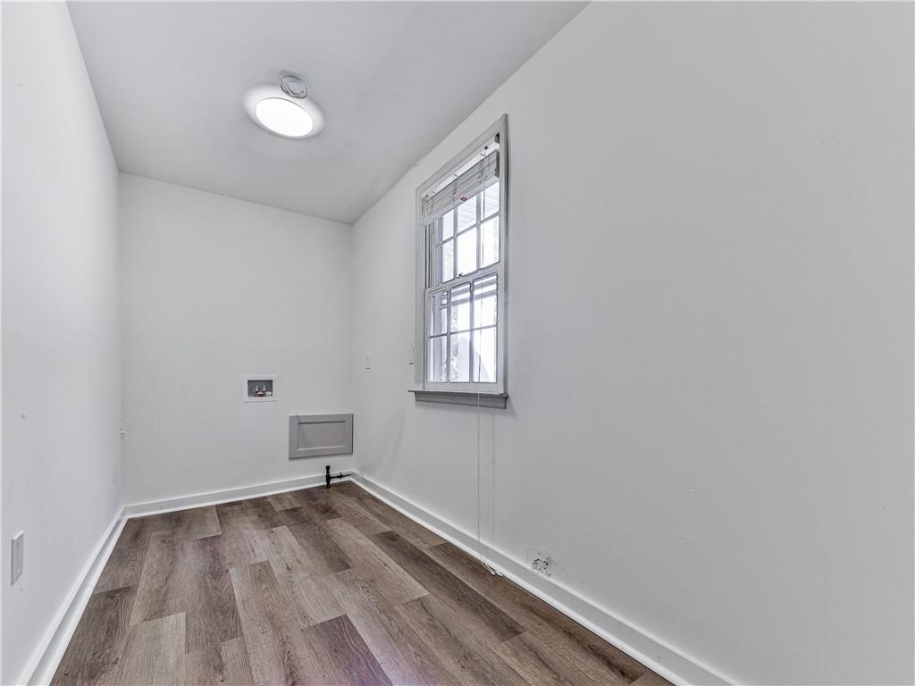 633 Butterworth Road Canton, GA 30114 - Photo 38 of 55 a view of a room with wooden floor and fan
