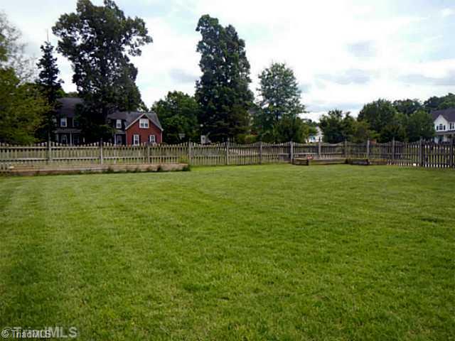 7834 Wilson Farm Road Summerfield, NC 27358 - Photo 14 of 16 Exterior Back. Two raised garden beds and nice fenced in backyard.