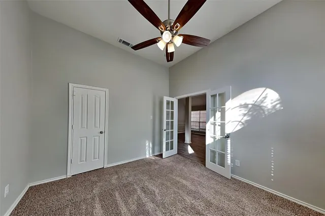 en empty room with windows