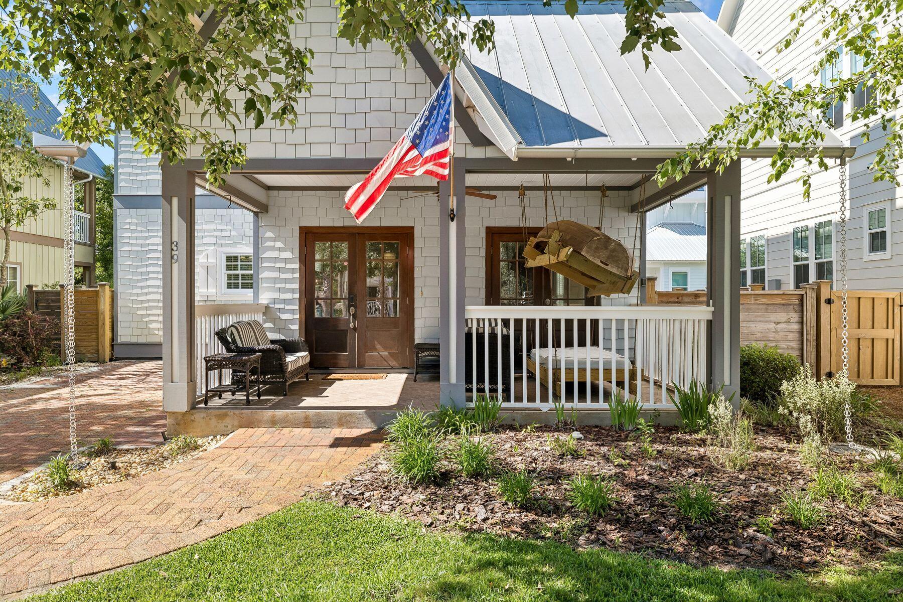 39 Willow Mist Road Inlet Beach, FL 32461 - Photo 3 of 41 a front view of a house with a porch