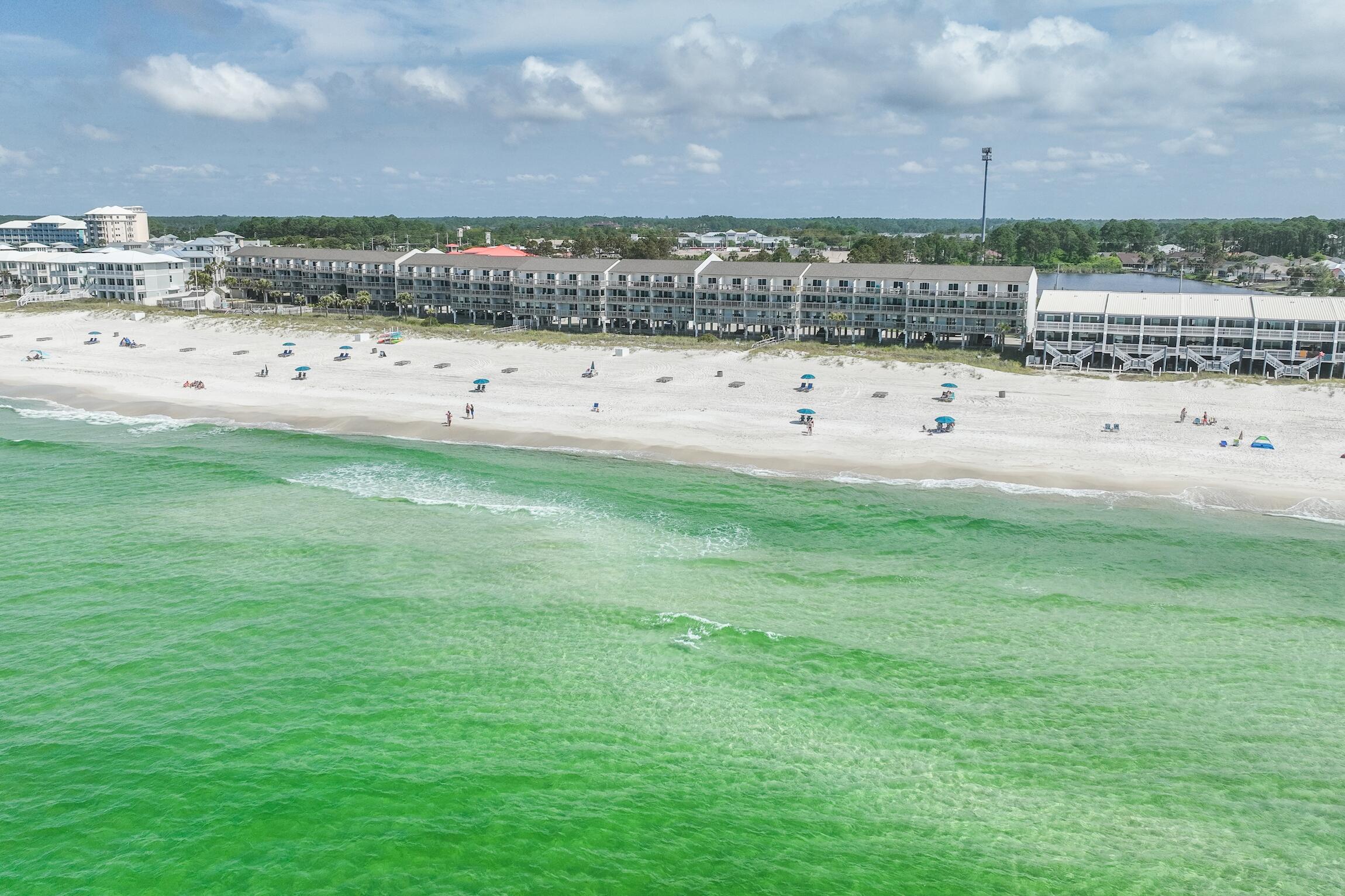 23011 Front Beach Road, Unit 24 Panama City Beach, FL 32413 - Photo 22 of 23 a view of a field with an ocean view