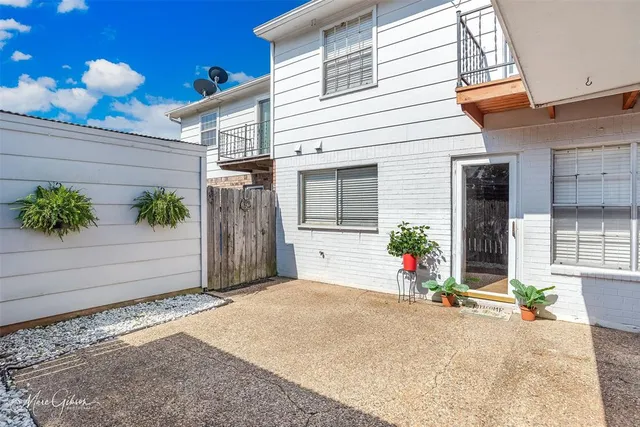 a front view of a house with a garage