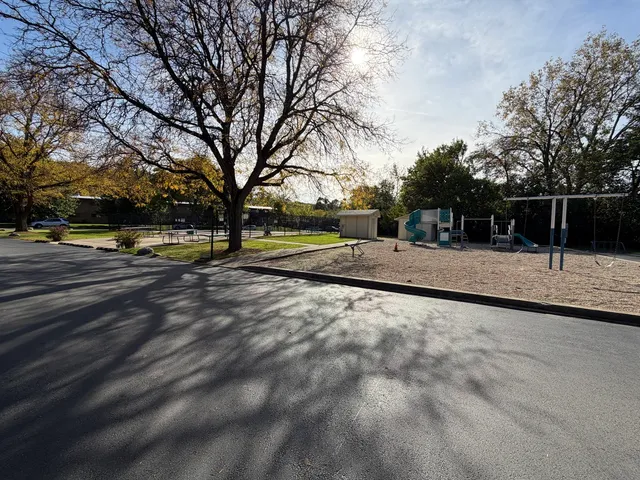 a view of road with yard