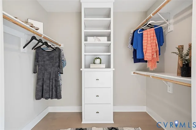 view of closet with clothes and shoes