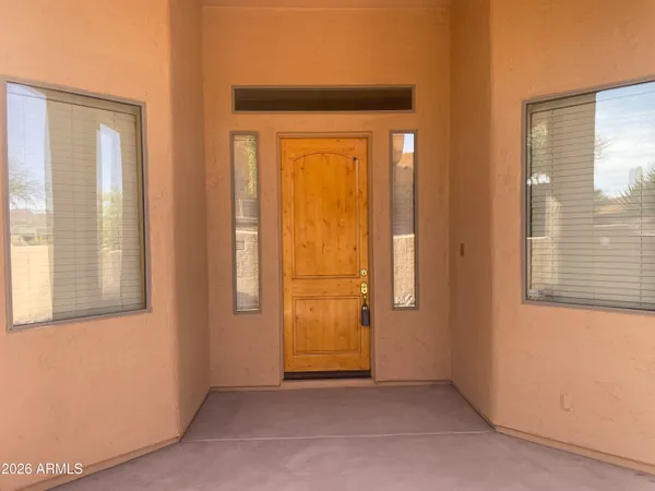 a view of a bathroom with a glass door