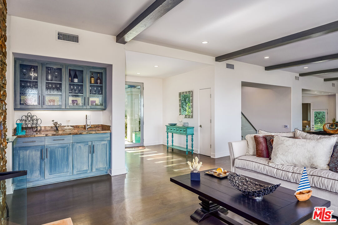 28907 Wight Road Malibu, CA 90265 - Photo 8 of 54 a living room with furniture and wooden floor
