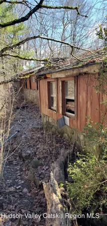 a view of a backyard of the house