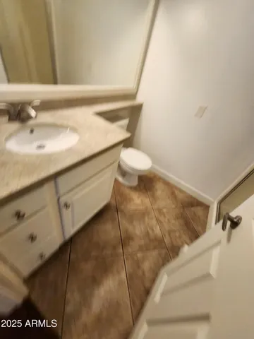 a bathroom with a sink and a vanity