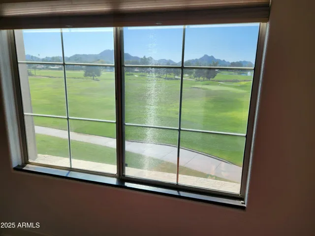 a bathroom with a glass door