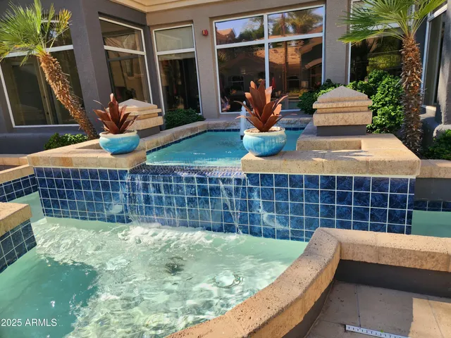 a view of a house with backyard and porch