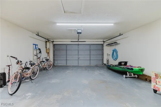 a view of a garage with rack and bicycle