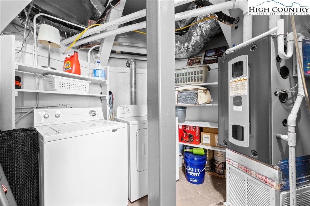 109 Skiloft Road Beech Mountain, NC 28604 - Photo 27 of 30 a utility room with dryer and washer