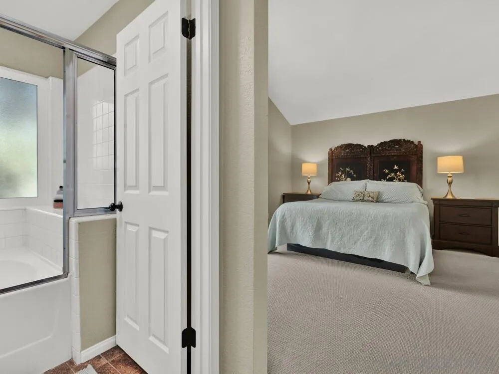 1591 Madrid Drive Vista, CA 92081 - Photo 16 of 40 a bedroom with a bed and a closet