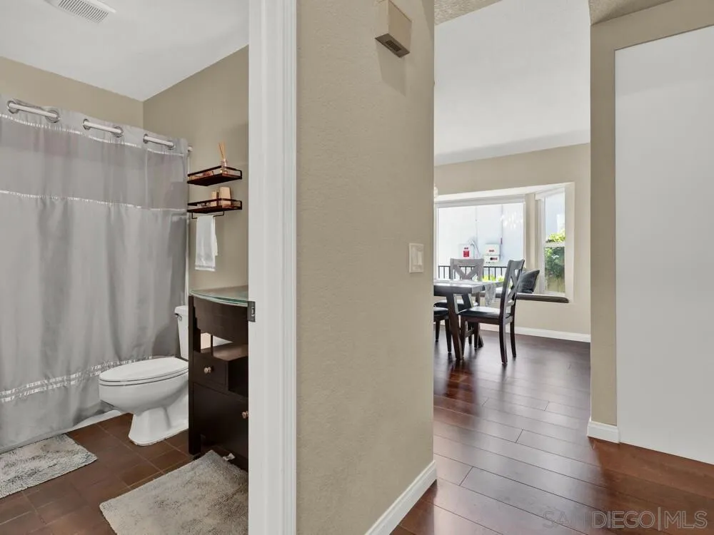 1591 Madrid Drive Vista, CA 92081 - Photo 18 of 40 a living room with furniture and a table