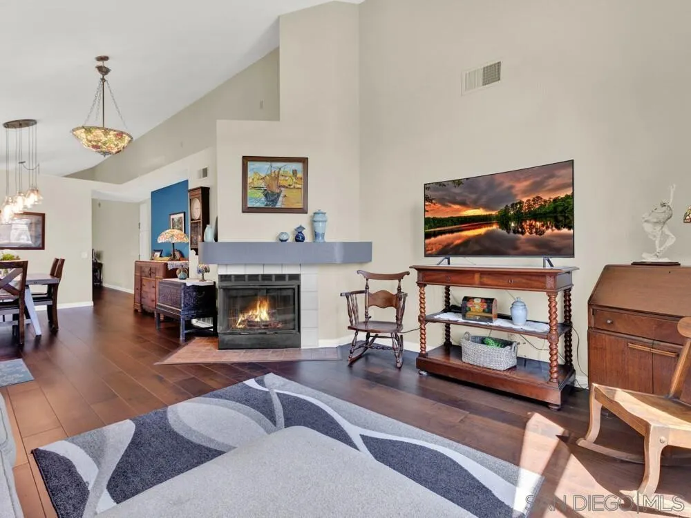 1591 Madrid Drive Vista, CA 92081 - Photo 3 of 40 a living room with furniture and a fireplace