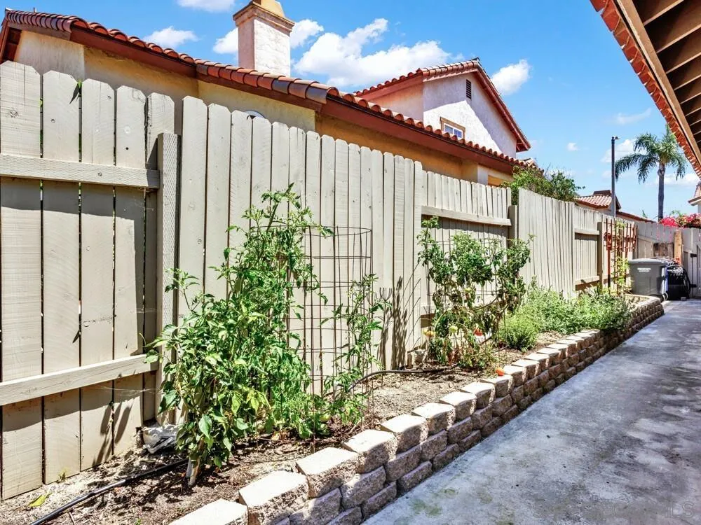 1591 Madrid Drive Vista, CA 92081 - Photo 37 of 40 a view of a house with a garden