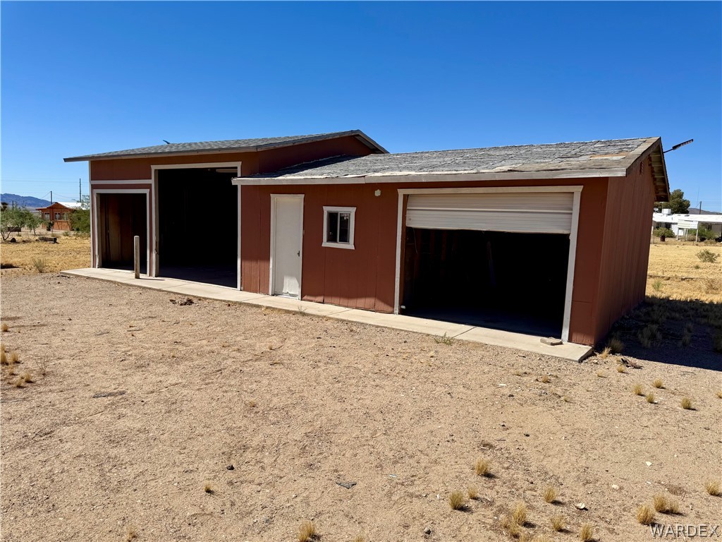 8051 7th Street Dolan Springs, AZ 86441 - Photo 3 of 65 a front view of a house