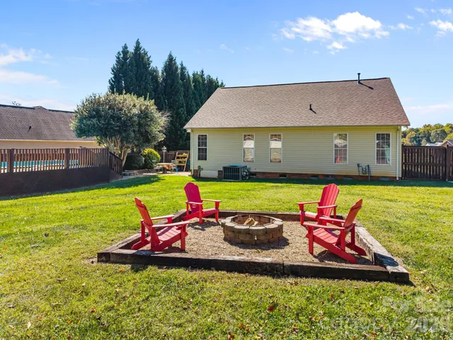 a view of patio with table and chairs