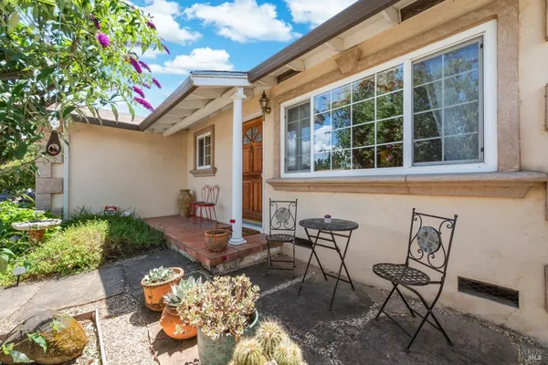 a front view of a house with patio