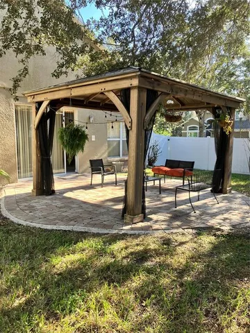 a white toilet sitting next to a shower