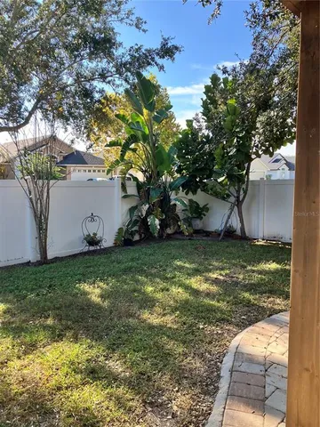 a bathroom with a tub and a sink