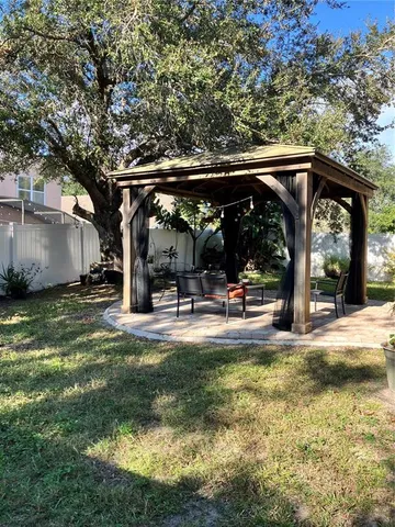 a white toilet sitting next to a white toilet