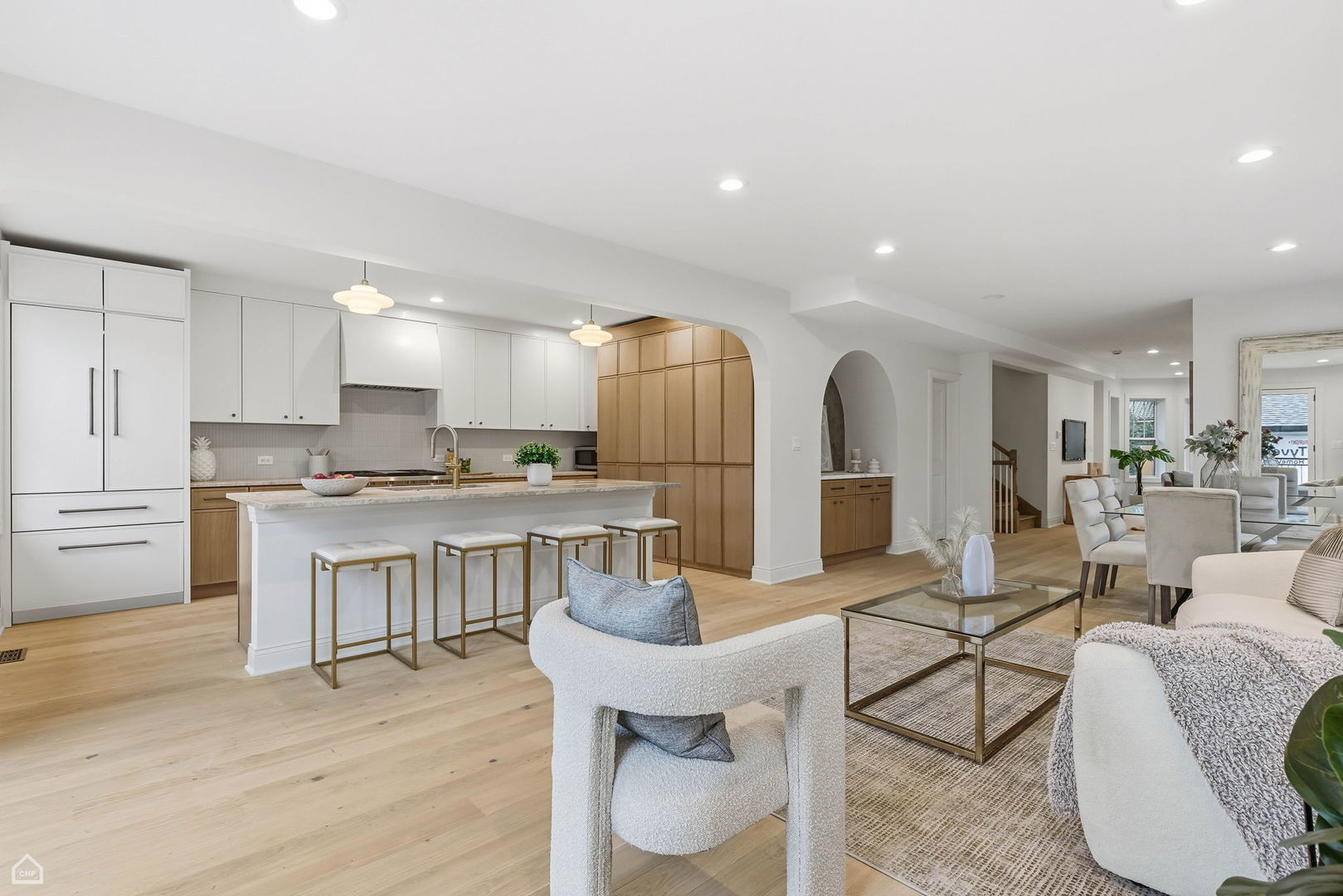 Undisclosed Address Chicago, IL 60625 - Photo 11 of 36 a open kitchen with white cabinets and stainless steel appliances
