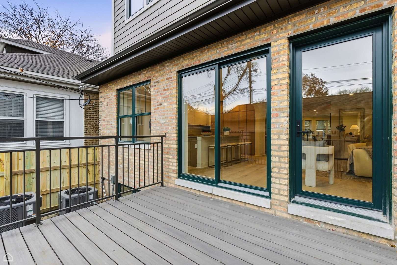 Undisclosed Address Chicago, IL 60625 - Photo 19 of 36 a view of a brick house with large windows