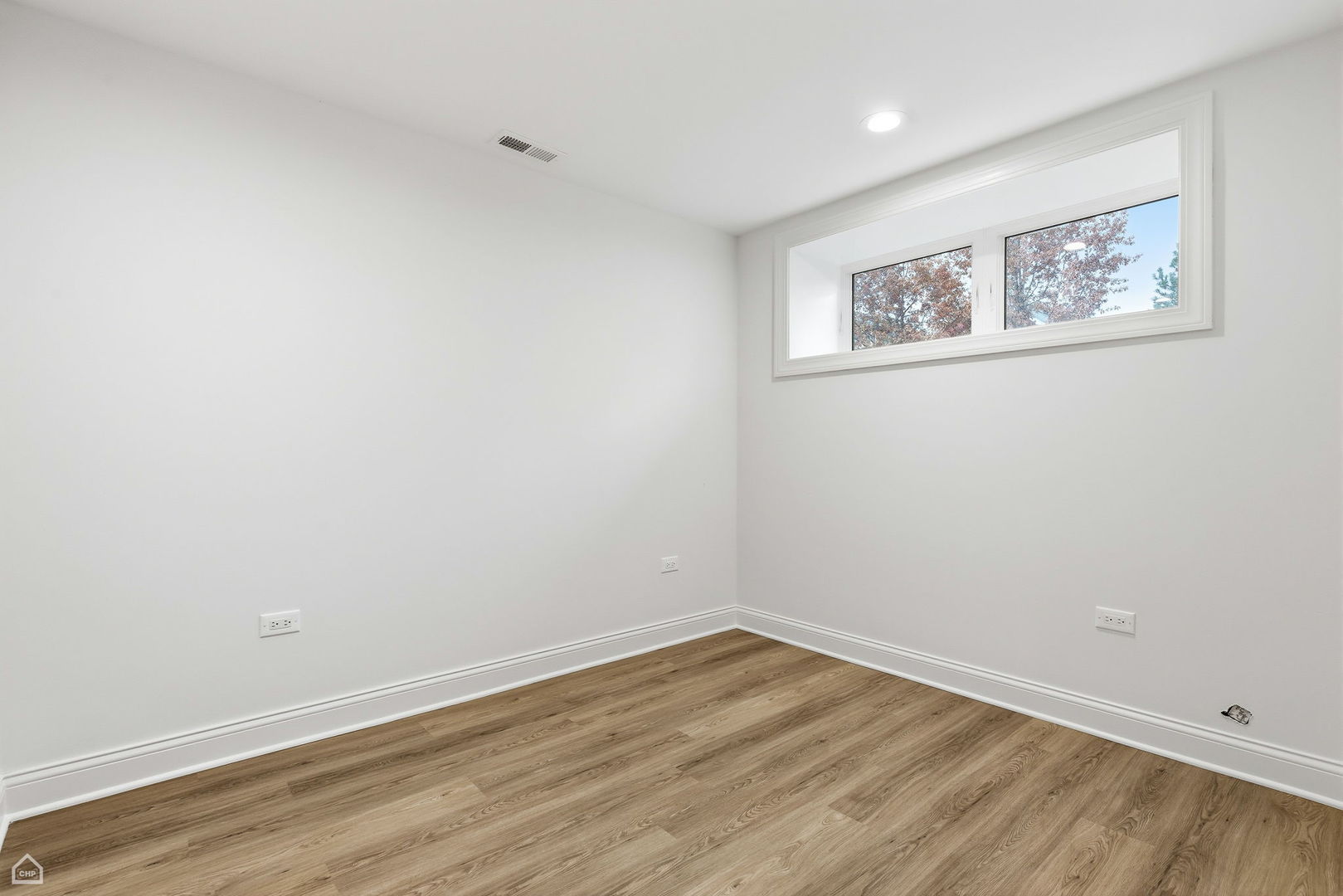 Undisclosed Address Chicago, IL 60625 - Photo 33 of 36 a view of a room with wooden floor and closet